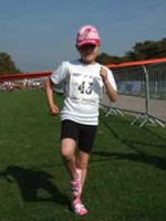 A youngster runs to raise funds for Action for Children