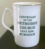 Inscription on centenary mug