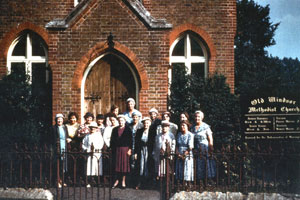 Members of the Women's Meeting outside the Church