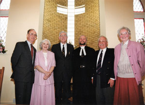 Rev James Booth with the church stewards and organist