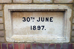 The foundation stone on the front of the building